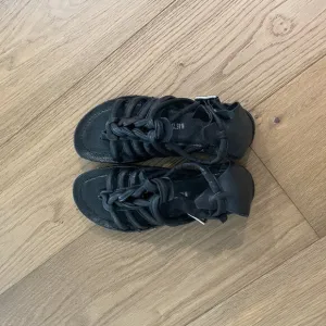 A.S. 98 Black braided leather cage sandal