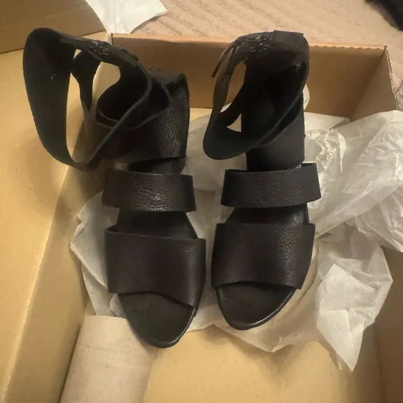 Black sandals with thick straps chunky heel and platform