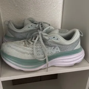 HOKA Women's Gray and White Running Shoes