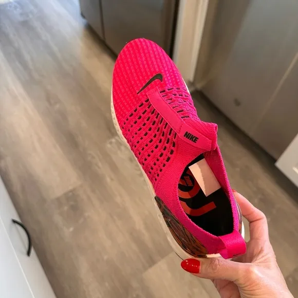 Nike React slip on tennis shoes.  Size 8 worn a few times.