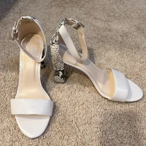 NWOT! Nine West SZ 9.5 M pruce ankle strap , snake print block heel sandals.