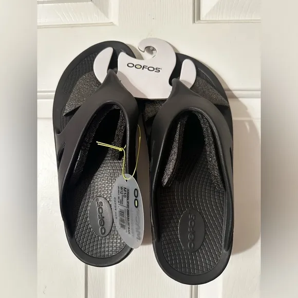 NWT OOFOS ORIGINAL SPORT UNISEX SOLOIST BLACKM10 W12 STYLE #1001 FLIP FLOPS