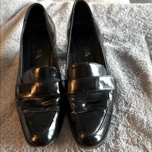 PRADA Elegant Black Loafers for Women